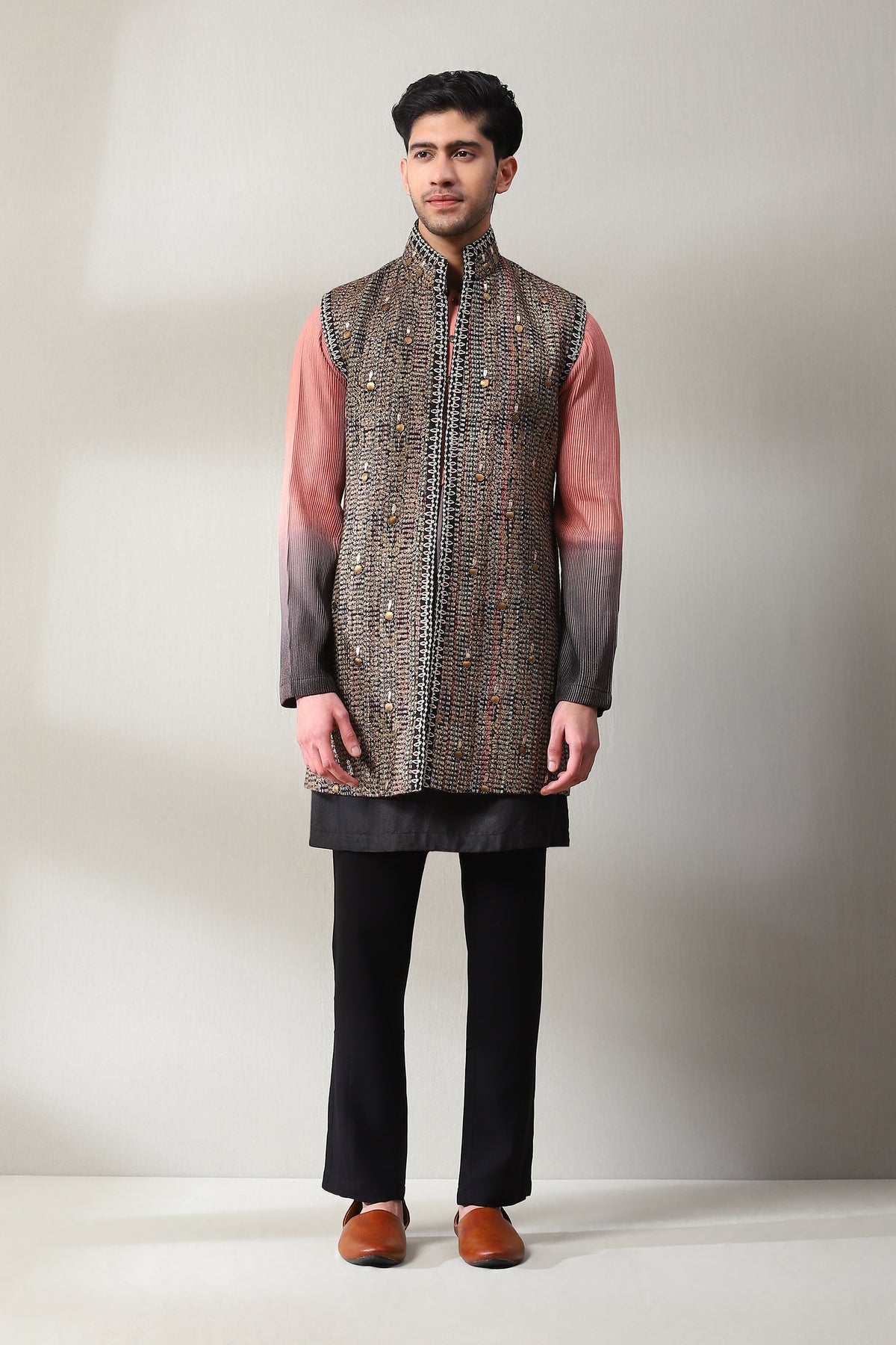 This handloom black and multicoloured long sleeveless jacket with the slim pants