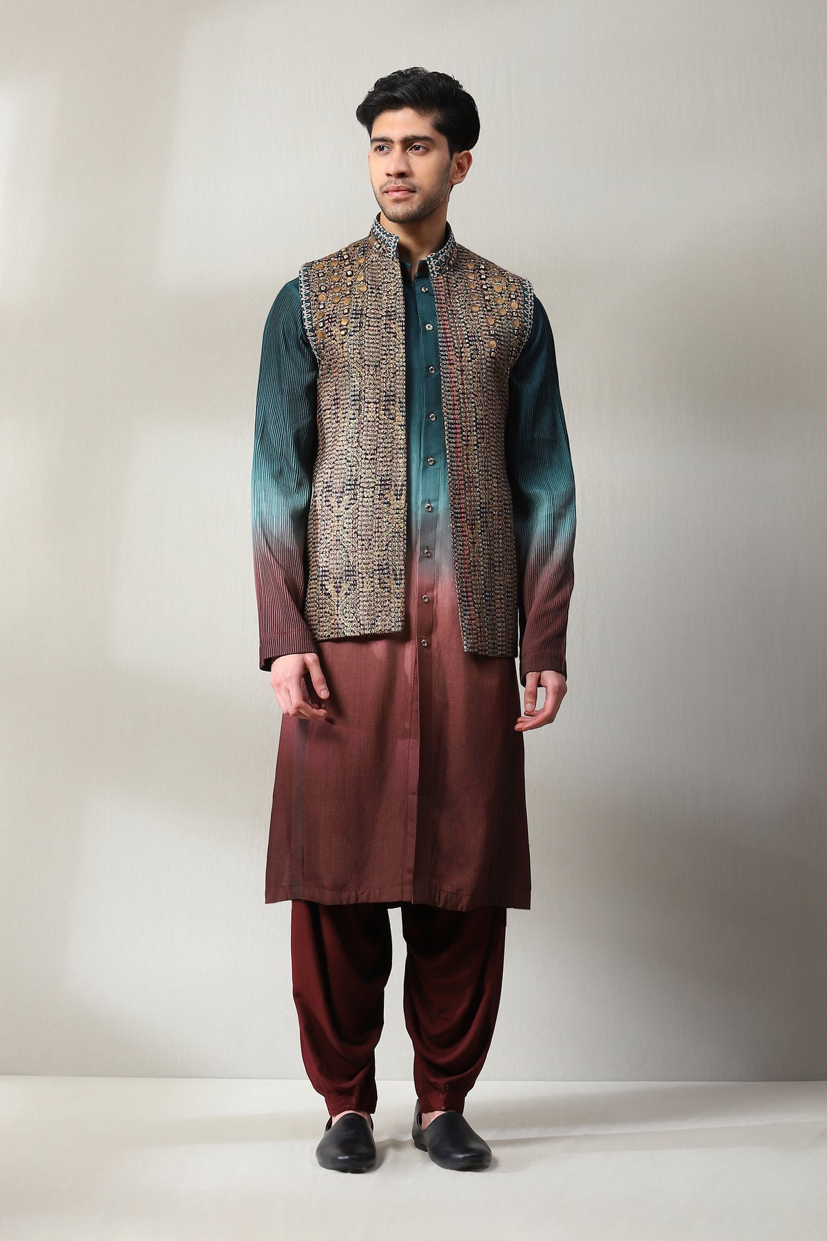 This handloom  multicoloured long sleeveless jacket WITH SLIM PANTS