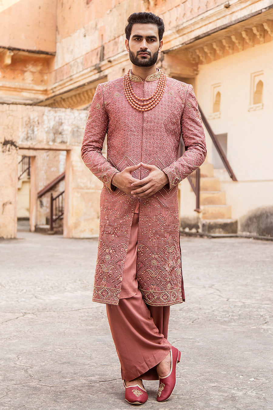 Sherwani Matched With A Carrot Coloured Velvet Stole And Accessories