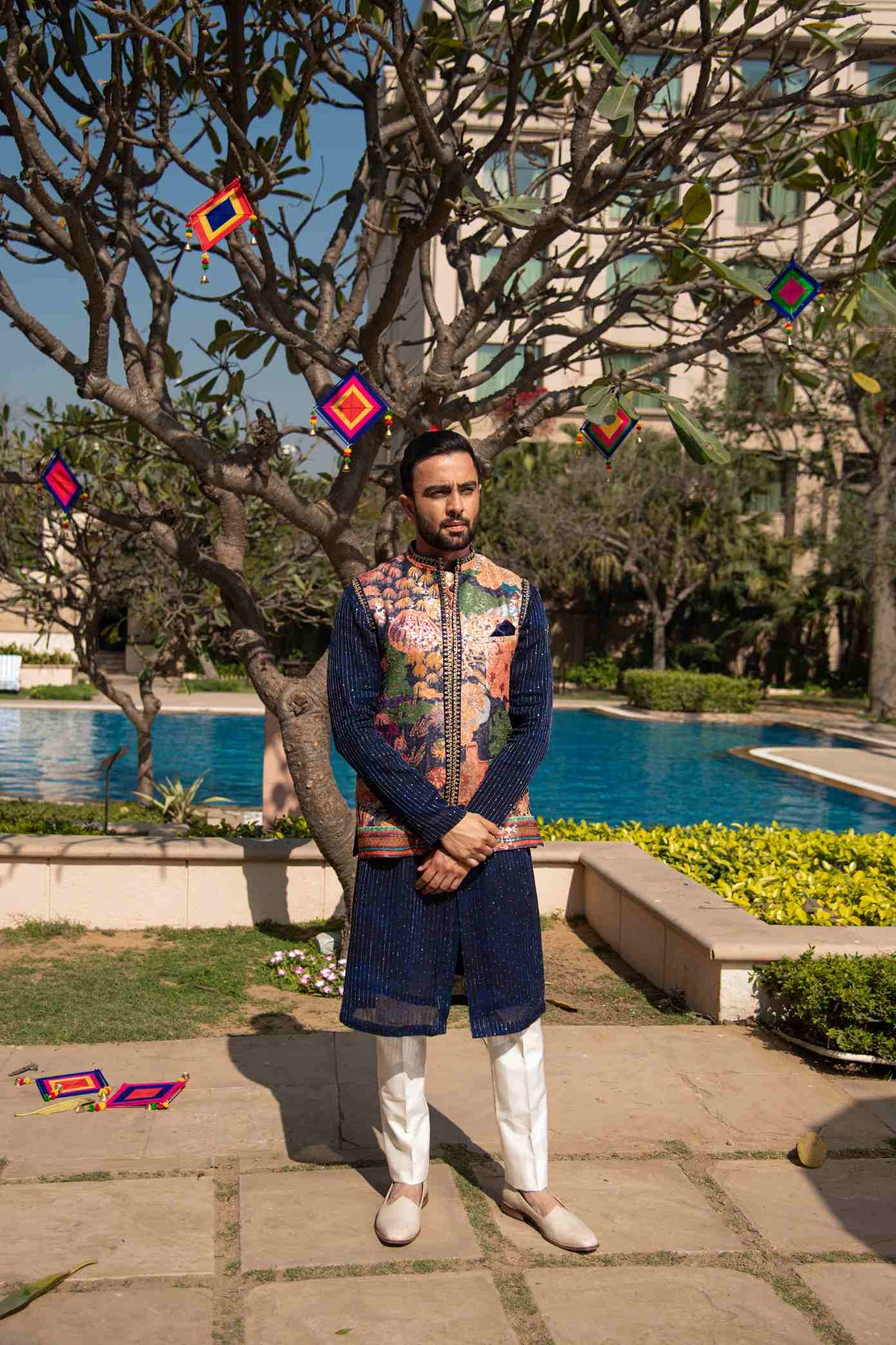 A Printed Jacket In Handmade Fabric Matched With A Navy Blue Kurta In Georgette