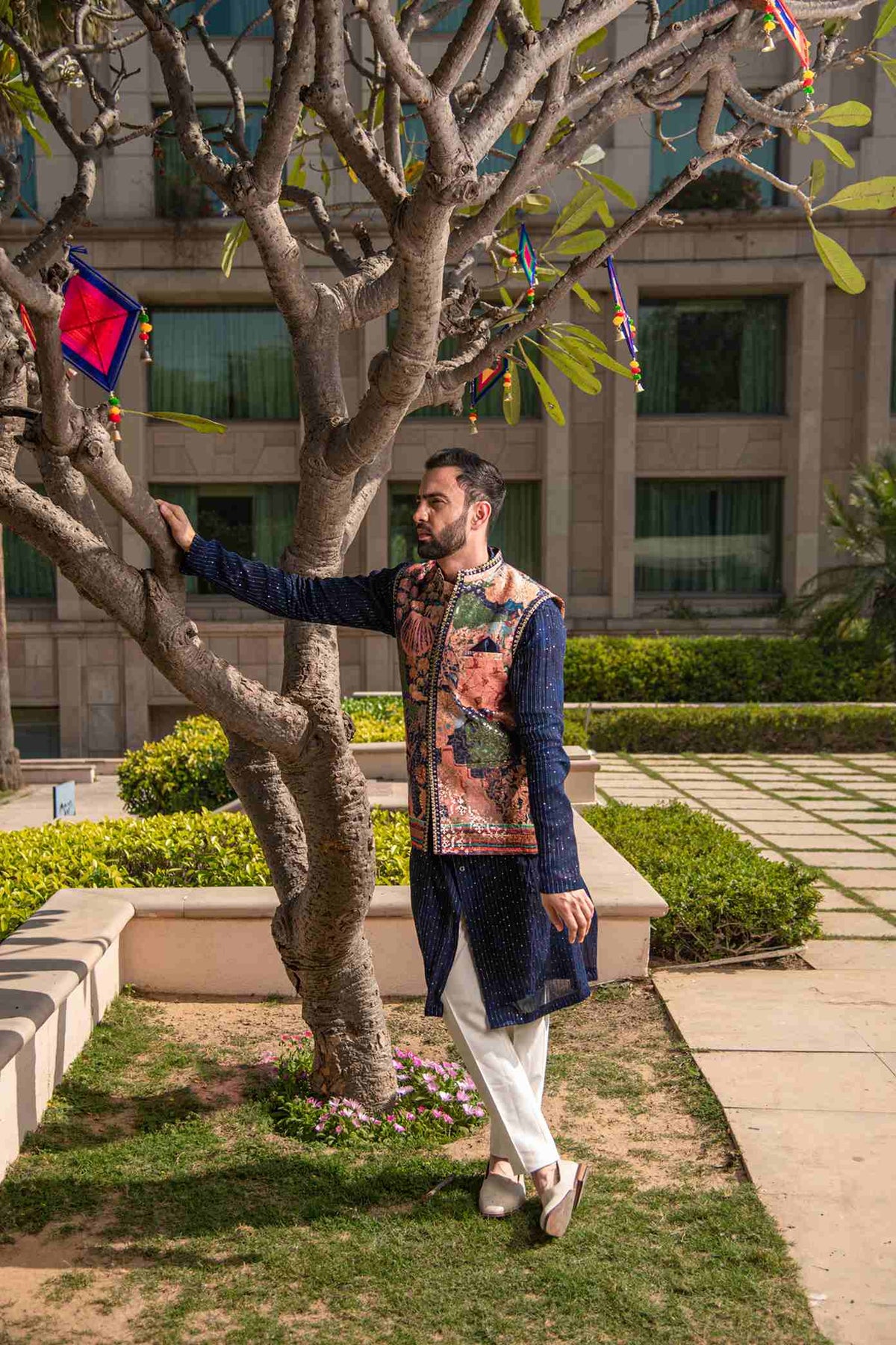 A Printed Jacket In Handmade Fabric Matched With A Navy Blue Kurta In Georgette