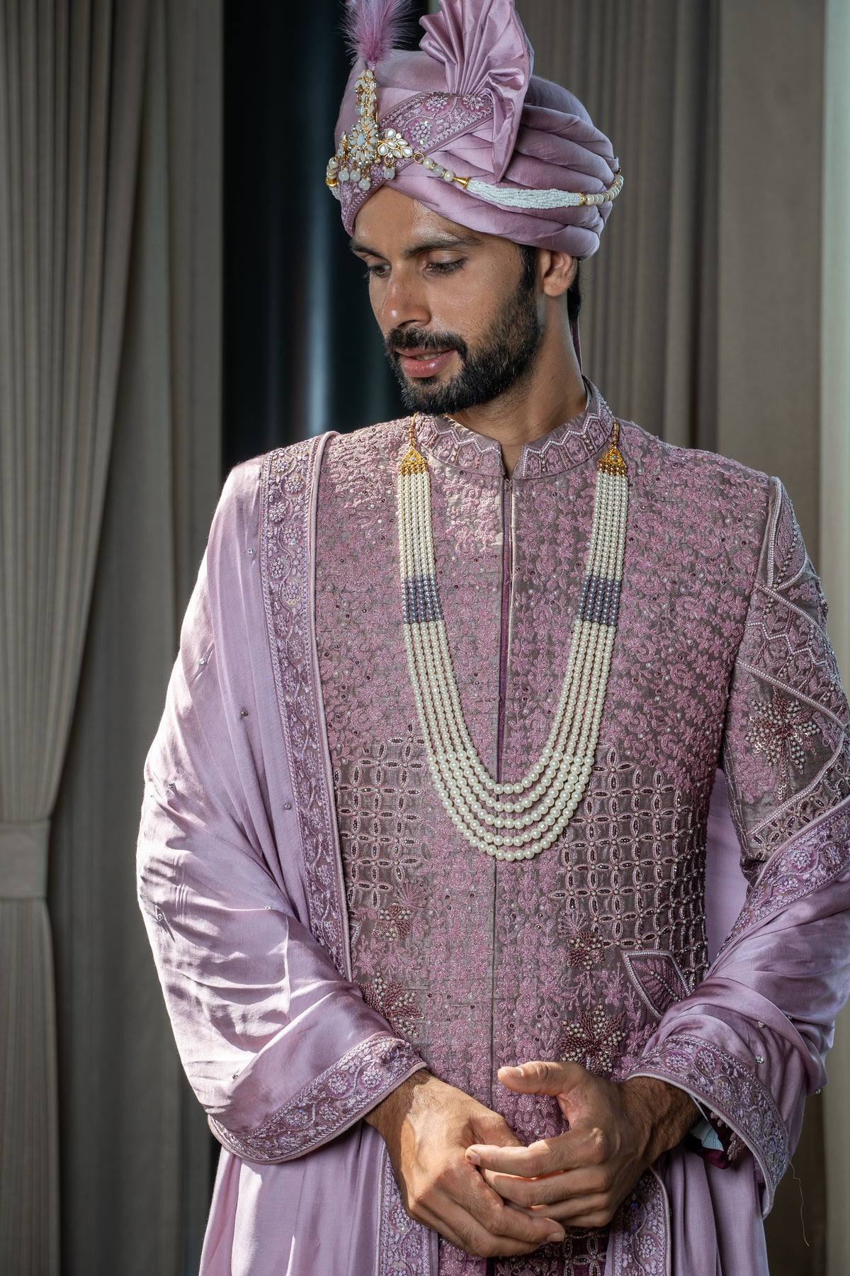 This pink colored sherwani
