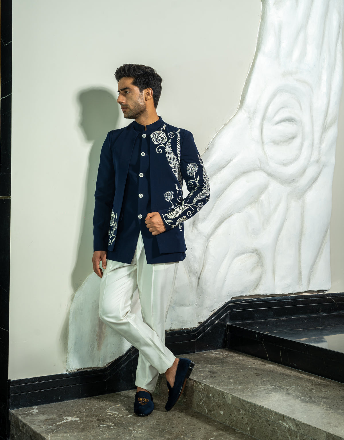This blue jodhpuri with zero neck jacket
