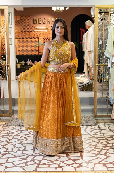 Mustard Coloured Lehenga With A Halter Blouse