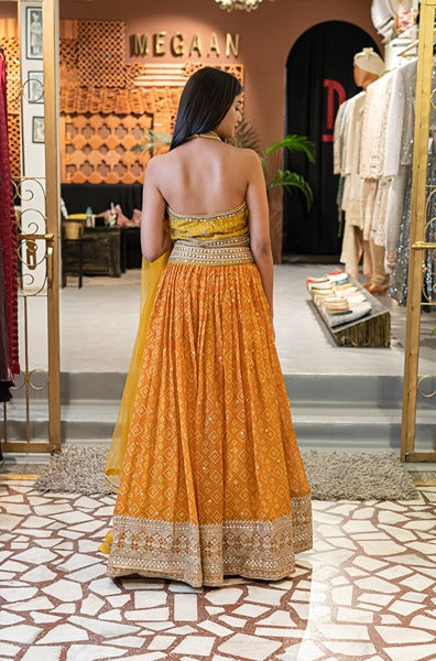 Mustard Coloured Lehenga With A Halter Blouse
