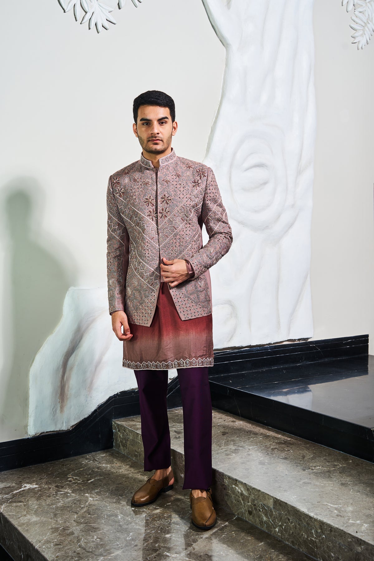 This nude pink colored jodhpuri